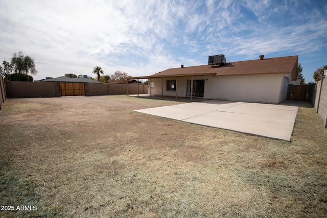 back of house featuring a patio and cooling unit