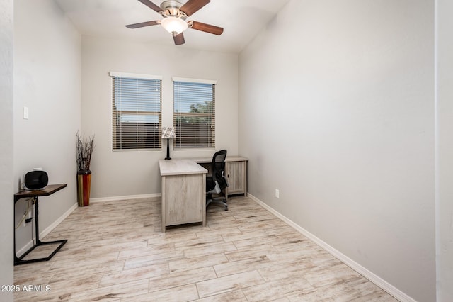 2611 S Quaintance St, Gilbert, AZ 85295 - home office featuring a ceiling fan, baseboards, and light wood-type flooring