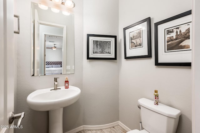 2611 S Quaintance St, Gilbert, AZ 85295 - bathroom with toilet, baseboards, and ceiling fan