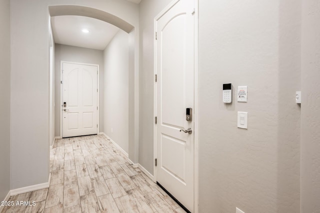 2611 S Quaintance St, Gilbert, AZ 85295 - hall featuring arched walkways and baseboards