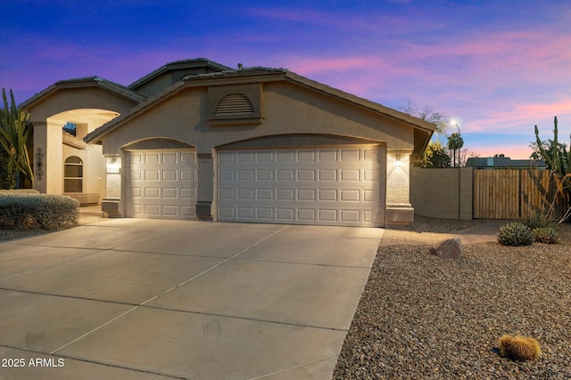 view of front of property with a garage