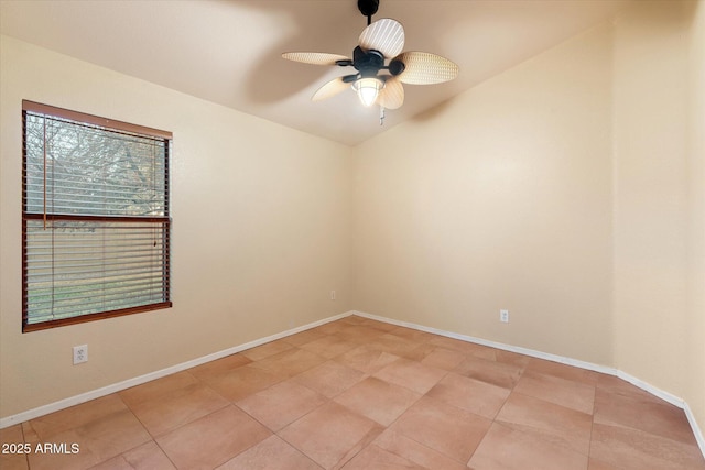 unfurnished room with light tile patterned floors and ceiling fan