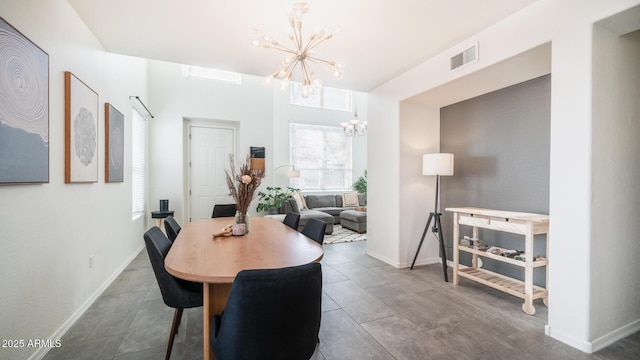 dining area featuring a chandelier