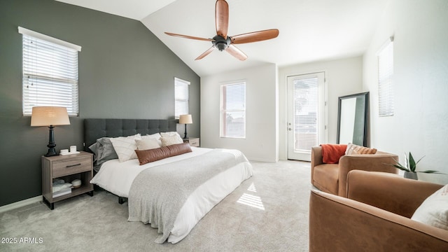 bedroom featuring ceiling fan, light carpet, and lofted ceiling