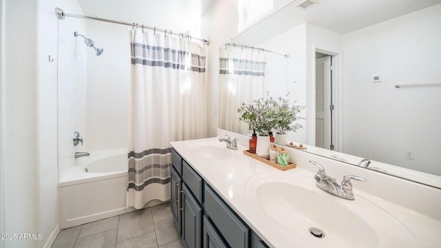 bathroom with vanity, tile patterned floors, and shower / bath combo with shower curtain