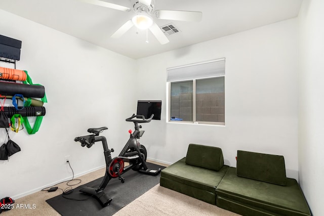 exercise room featuring visible vents, baseboards, carpet, and a ceiling fan