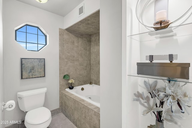 7763 W Libby St, Glendale, AZ 85308 - bathroom featuring tile patterned flooring, visible vents, and toilet