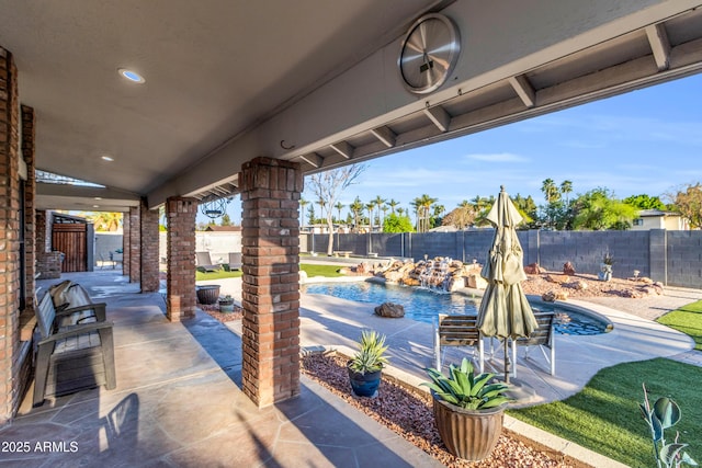 7763 W Libby St, Glendale, AZ 85308 - view of patio with a fenced backyard and a fenced in pool