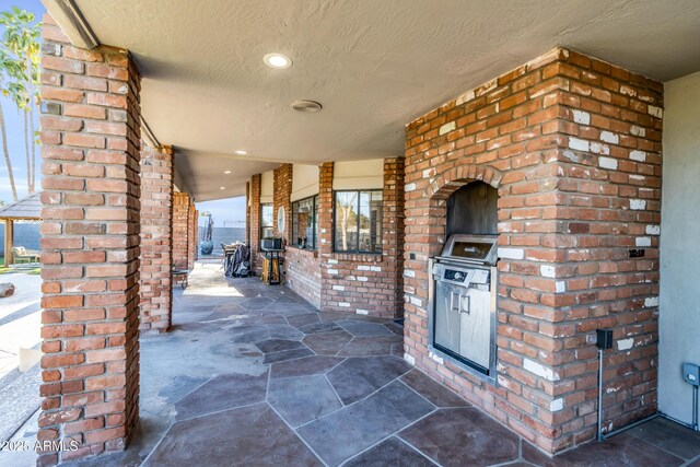 7763 W Libby St, Glendale, AZ 85308 - view of patio with area for grilling