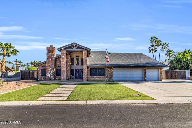 7763 W Libby St, Glendale, AZ 85308 - view of front of house featuring fence, a front lawn, concrete driveway, brick siding, and a garage