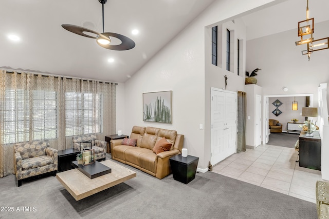 7763 W Libby St, Glendale, AZ 85308 - carpeted living room with high vaulted ceiling, baseboards, and tile patterned flooring