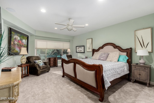 carpeted bedroom featuring ceiling fan