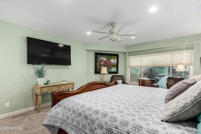 bedroom with light carpet and ceiling fan