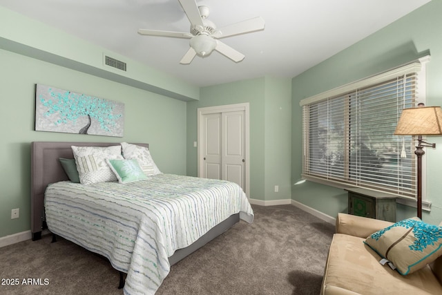 bedroom with ceiling fan and carpet floors