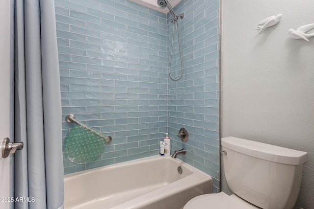 bathroom featuring toilet and shower / bath combo with shower curtain