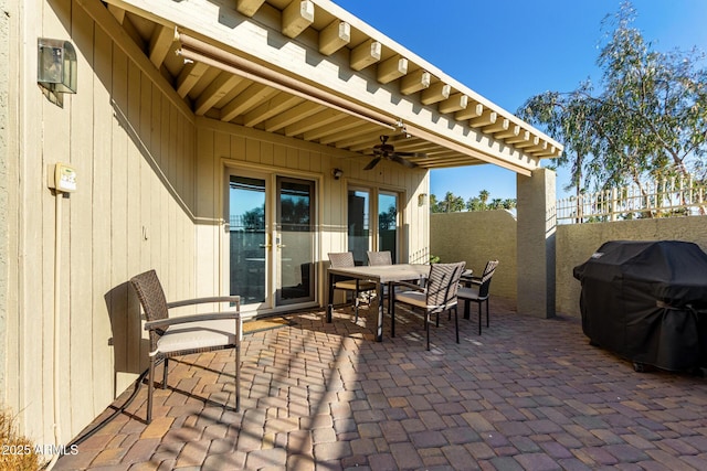 view of patio / terrace featuring a grill and ceiling fan