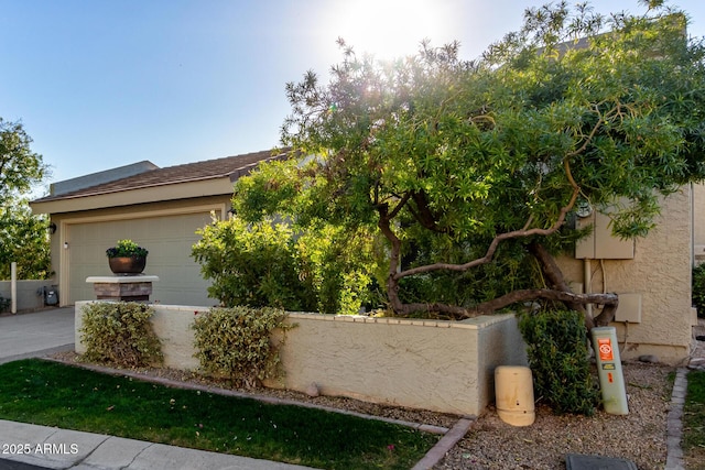 view of home's exterior featuring a garage