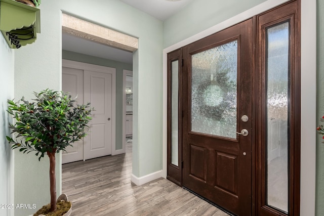 foyer entrance featuring light hardwood / wood-style floors