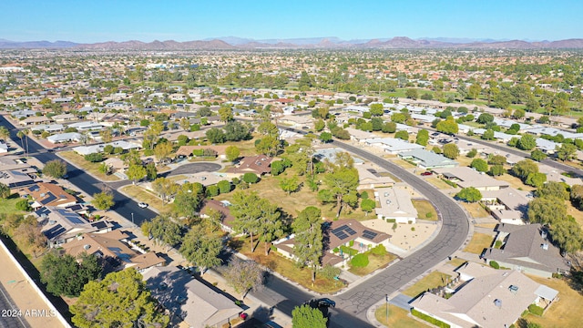 birds eye view of property with a mountain view