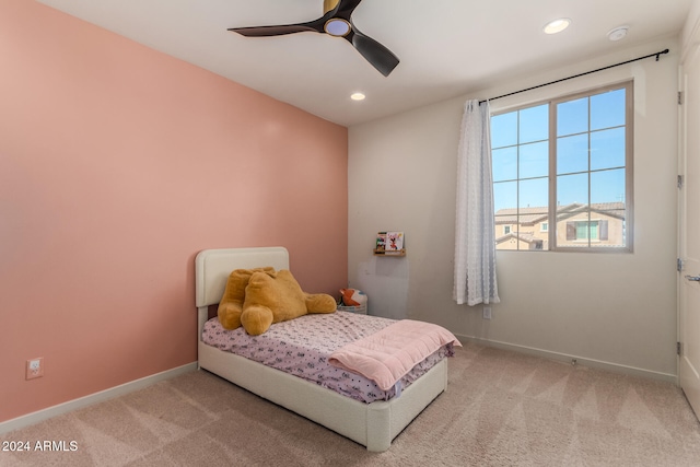 carpeted bedroom with ceiling fan