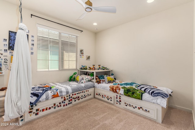 carpeted bedroom featuring ceiling fan