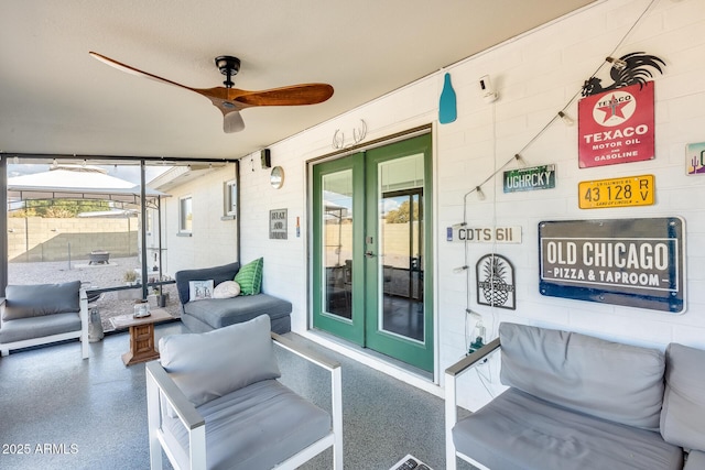 view of patio / terrace featuring french doors and ceiling fan