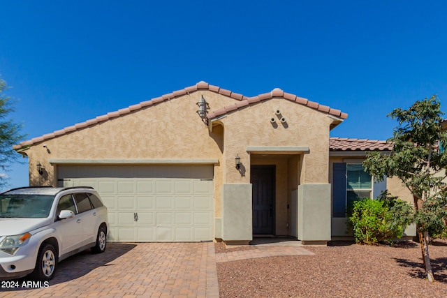 view of front of house with a garage