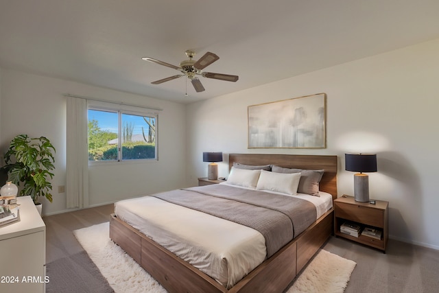 carpeted bedroom featuring ceiling fan