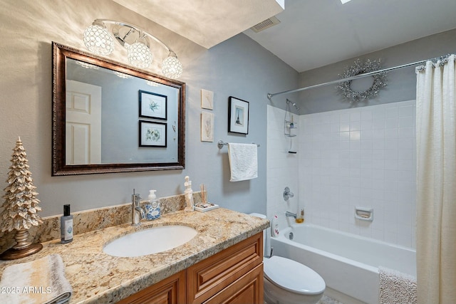 full bathroom featuring vanity, toilet, and shower / tub combo with curtain