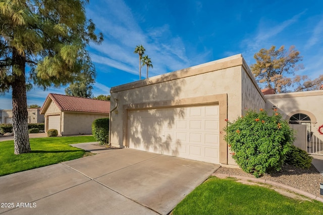 view of front facade with a front lawn and a garage