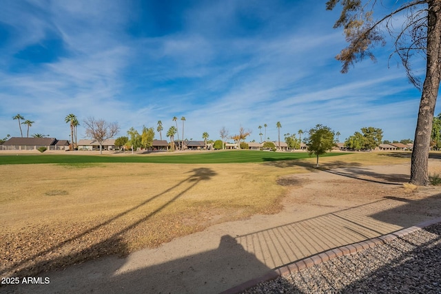 view of home's community featuring a yard