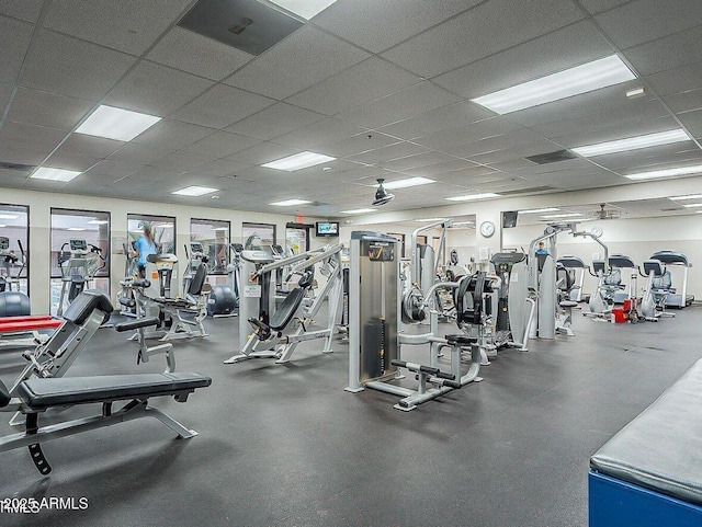 exercise room with a drop ceiling