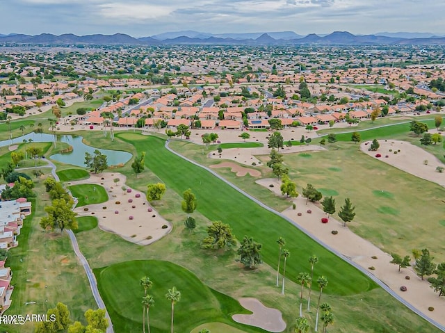 bird's eye view with a water and mountain view