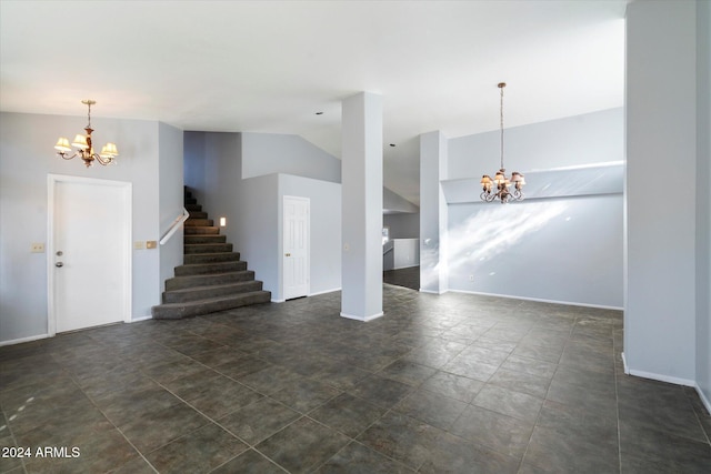 unfurnished living room with vaulted ceiling and an inviting chandelier