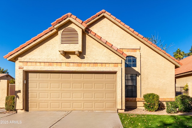 view of front of home with a garage