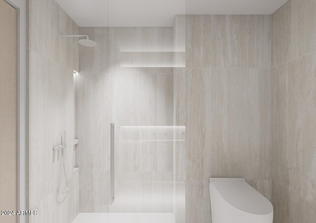 bathroom featuring a shower, tile patterned flooring, vanity, and tile walls