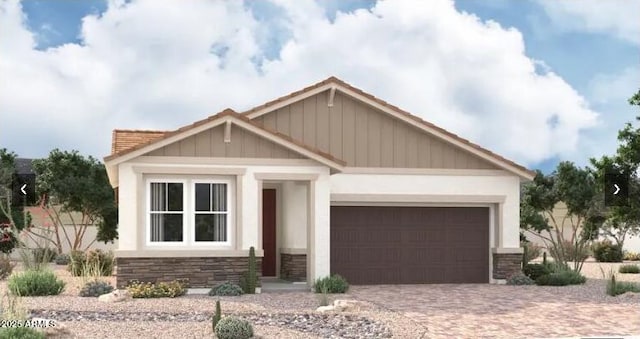 11404 S 50th Ln, Laveen, AZ 85339 - craftsman house featuring stone siding, a garage, decorative driveway, and stucco siding