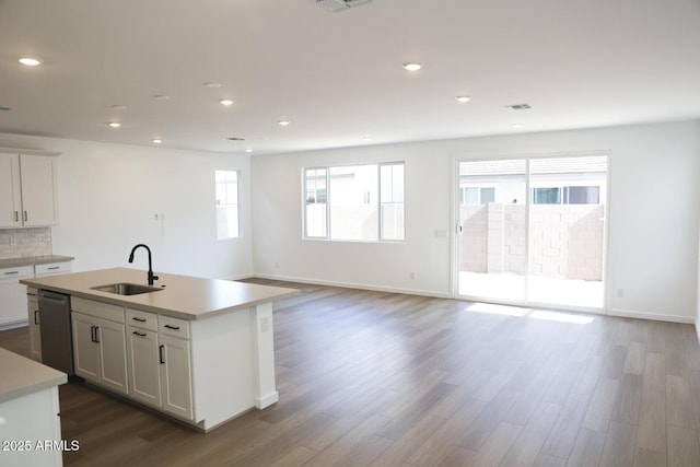 2482 W Rowel Rd, Phoenix, AZ 85085 - kitchen featuring a sink, dishwasher, light countertops, dark wood-type flooring, and recessed lighting