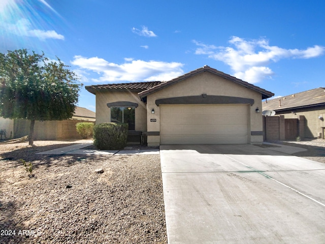 view of front of property with a garage