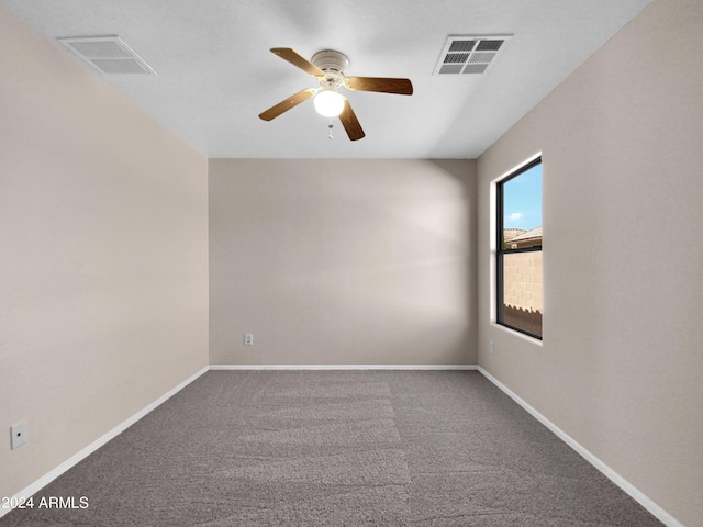 spare room with carpet flooring and ceiling fan