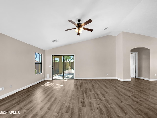 unfurnished living room featuring vaulted ceiling, ceiling fan, and dark hardwood / wood-style floors