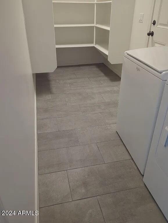 washroom with washer / clothes dryer