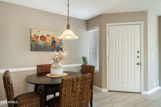 dining space featuring light wood-type flooring