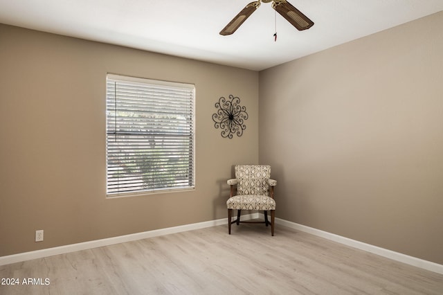 unfurnished room featuring ceiling fan and light hardwood / wood-style flooring