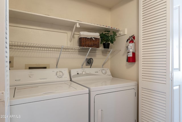 laundry area featuring separate washer and dryer