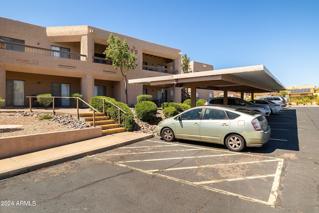 view of parking with a carport