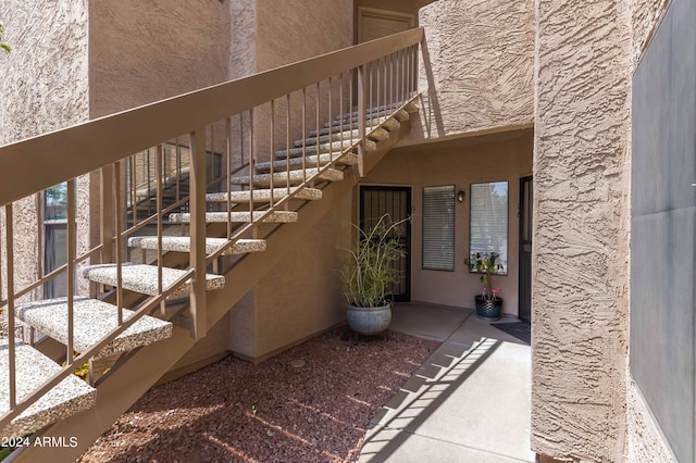 doorway to property featuring a balcony