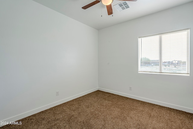 carpeted empty room with ceiling fan