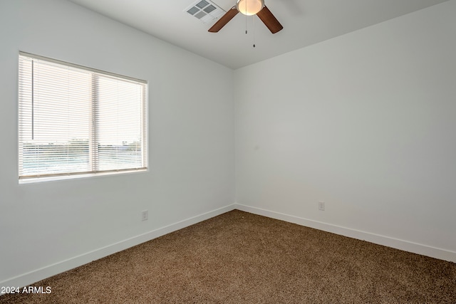 carpeted empty room with ceiling fan