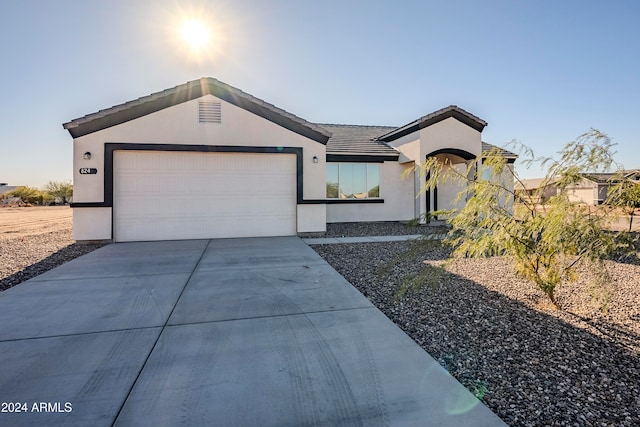 view of front of home featuring a garage